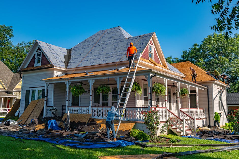 pexels-photo-33501308-33501308 Roofers replace the roof of a historic home in Weatherford, Texas.